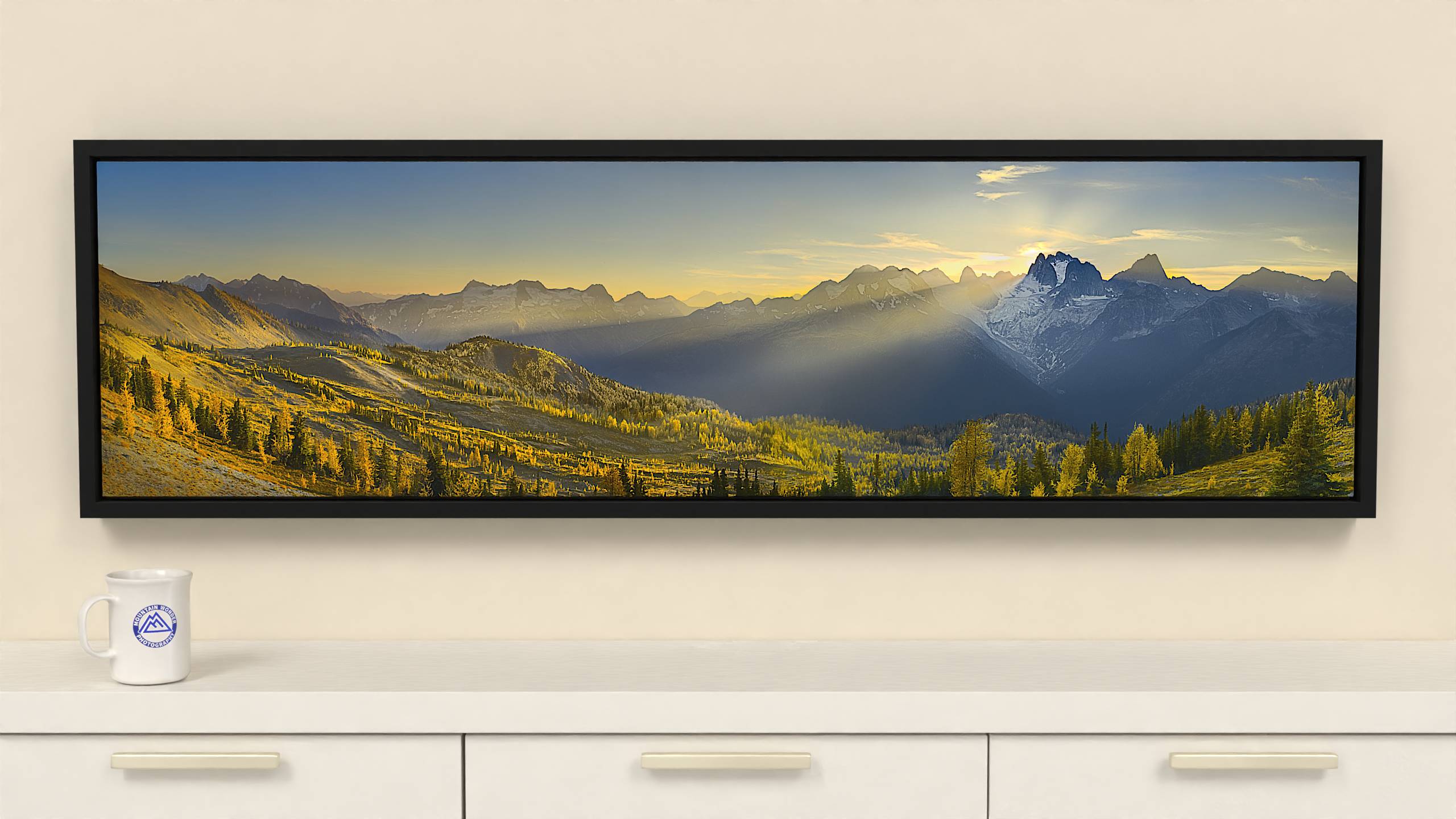 60x16 inch Wrapped canvas print with black floater frame. Capture the beauty of the Bugaboos with this panoramic canvas print featuring golden larches and majestic spires.